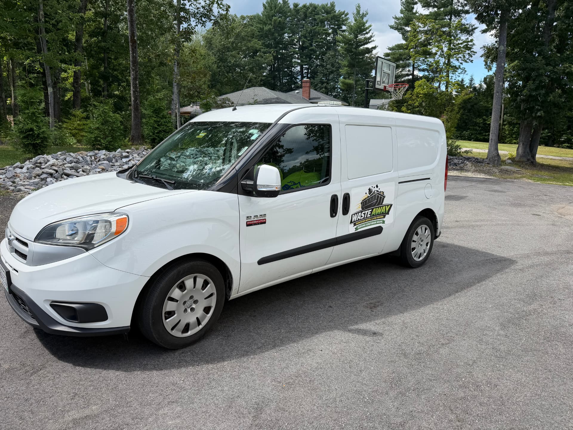 Waste Away branded van in a Maine driveway