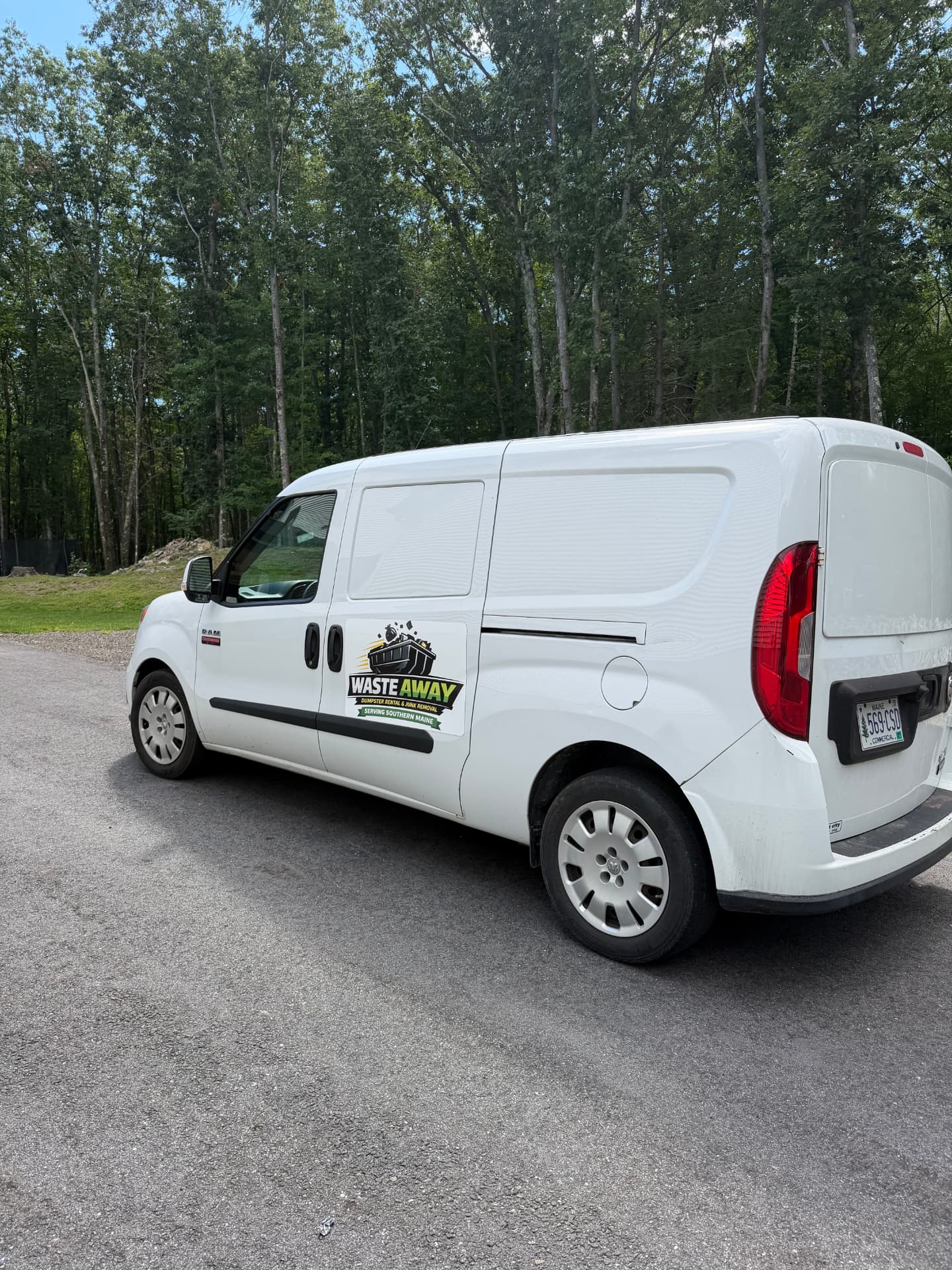 Side view of the Waste Away service van